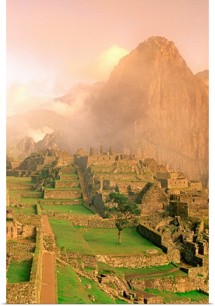 Incan ruins at the base of Machu Picchu in the Andes Mountains, Peru