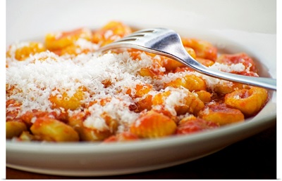 Italian gnocchi with parmesan cheese and tomato sauce