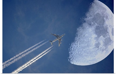 Jet in evening sky and moon, Germany.