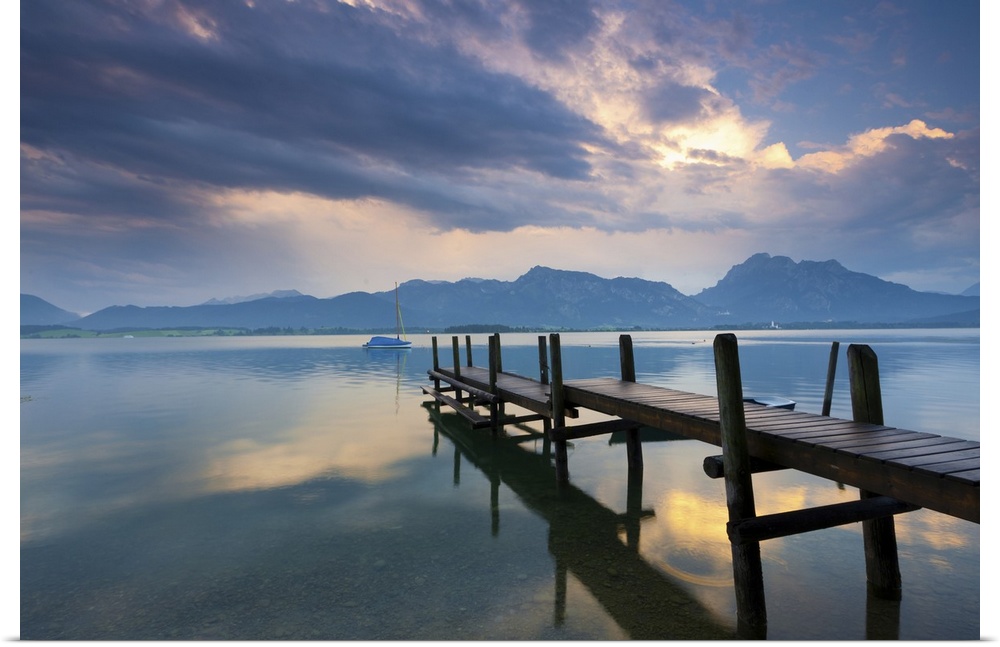 jetty at lake forggensee after a thunderstorm in the allgu, Bavaria, Germany