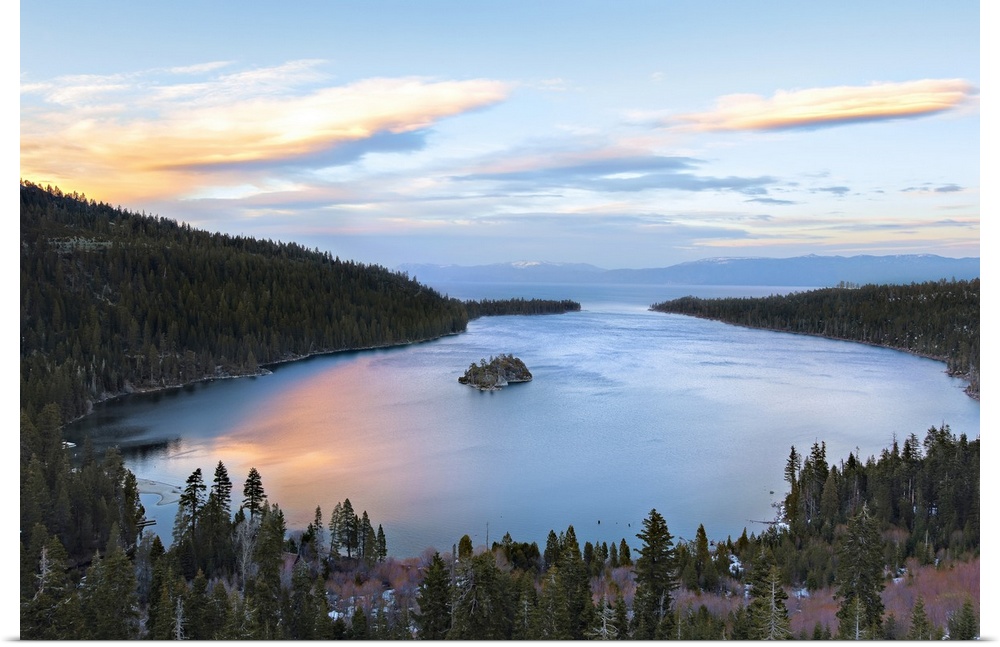 Emerald bay in lake Tahoe glows with reflection of springtime sunset.