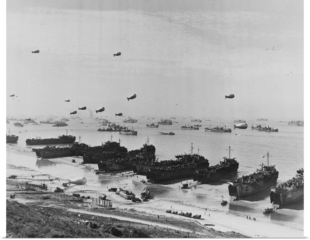 A panoramic view of Omaha beach during the Normandy Landings. Barrage balloons hover over assembled warships as the Allies...