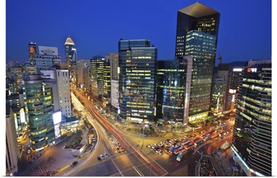 Light trail and buildings at the intersection, Seoul, Korea.