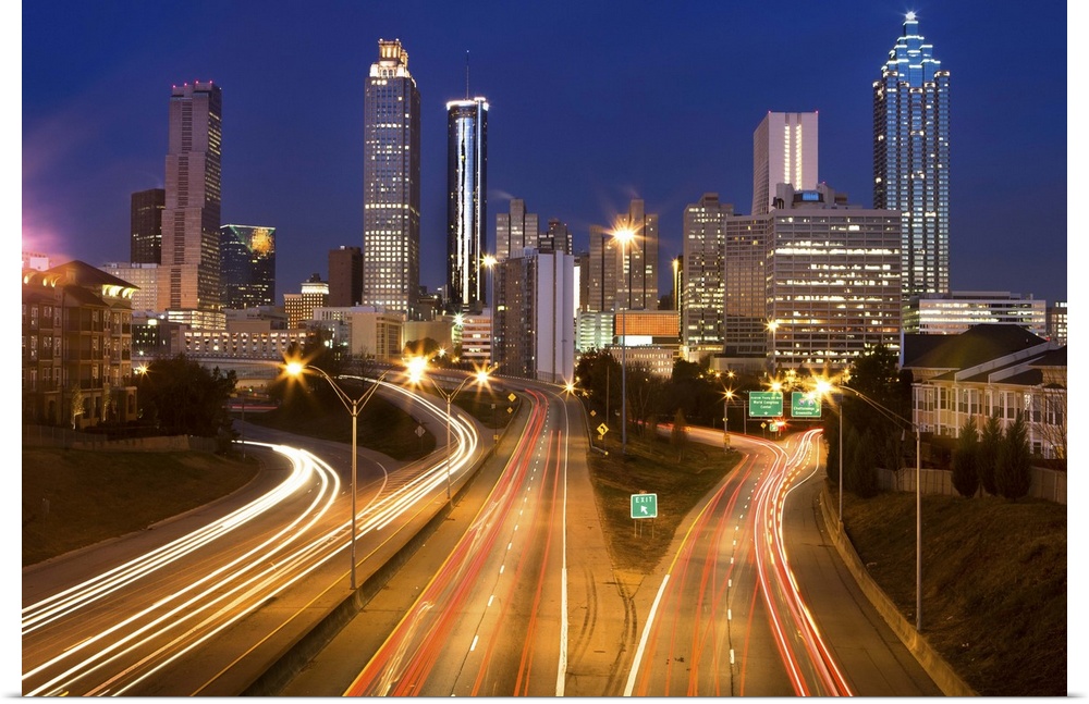 Atlanta city office buildings and highway traffic motion blur