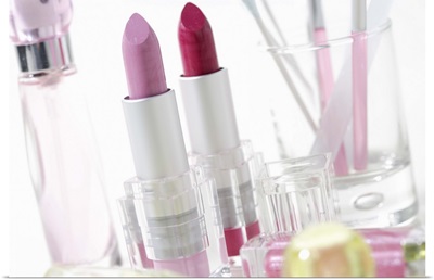 Lipsticks and perfume bottles