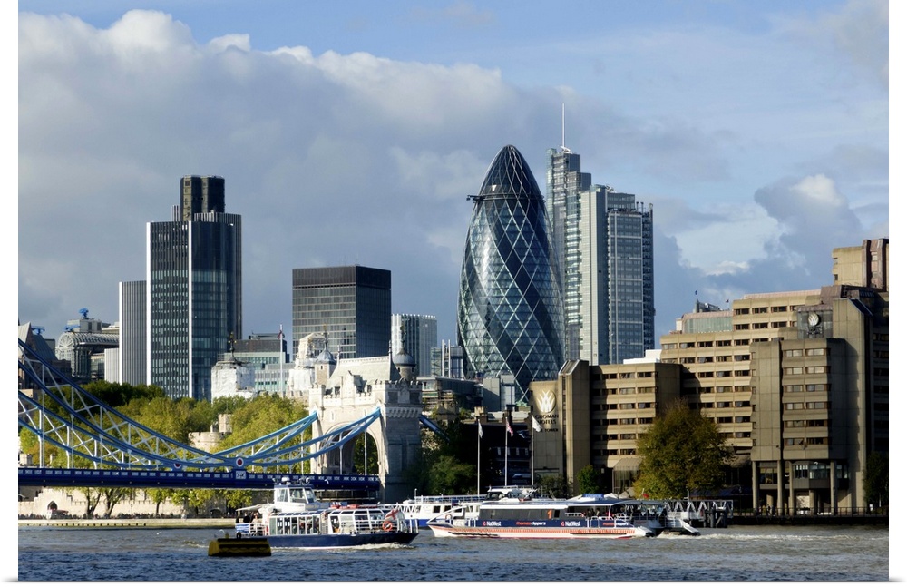Cityscape of City of London financial center acts as a backdrop for River Thames. This 2010 City skyline shows newly compl...