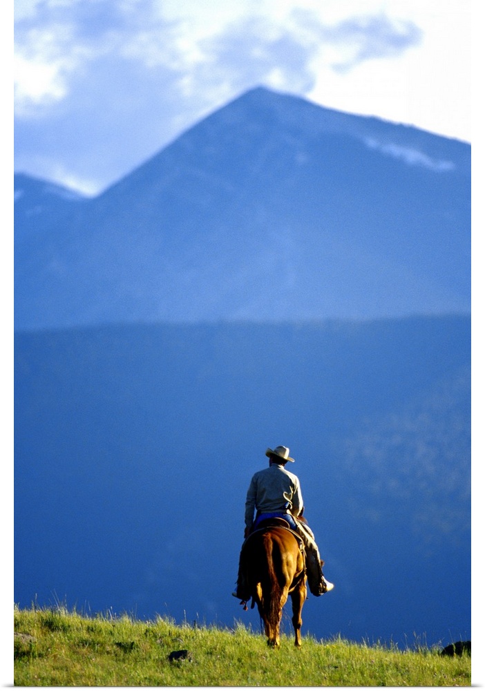 Lone Cowboy riding the range in Montana