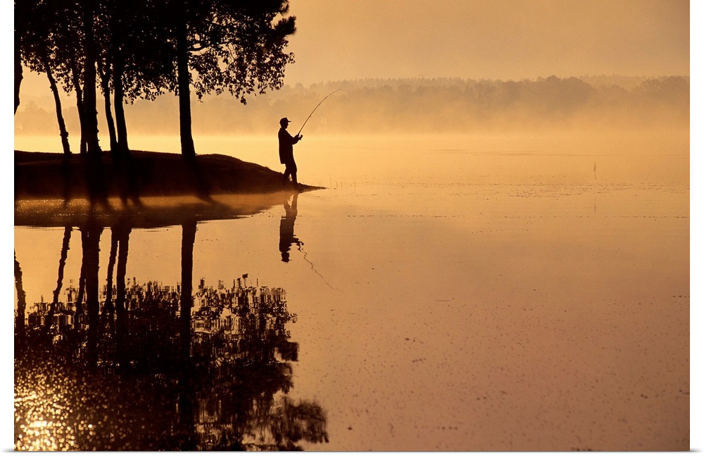 Man Fishing At Lake