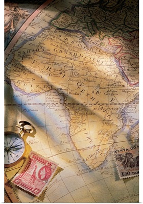 Map of Africa with compass and stamps
