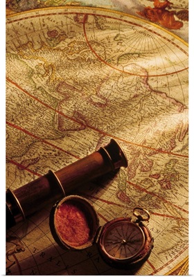 Map with spyglass and compass