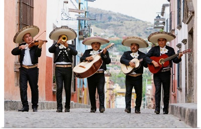 Mariachi band walking in street