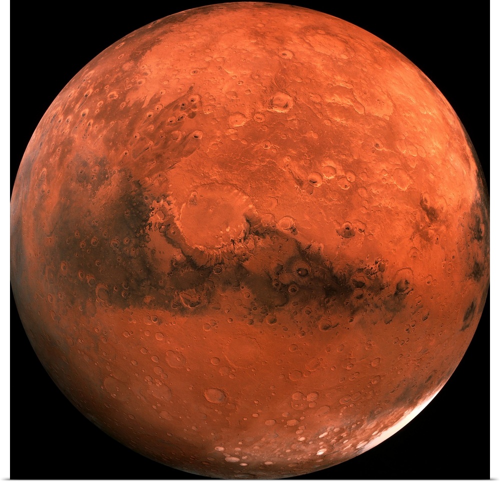Close-up color photograph of Mars. Impact craters are visible on the surface of the planet.