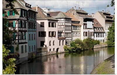 Medieval buildings along a canal, Strasbourg, France