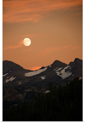 Moon over mountain range