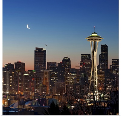 Moon rising over the iconic Space Needle, located in Seattle Washington, USA.