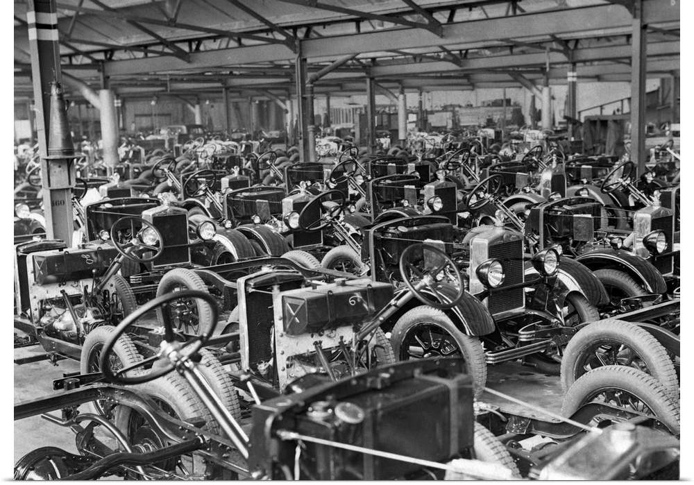 Many Morris Motors automobile chassis in the factory in Cowley wait for the bodies to be added.