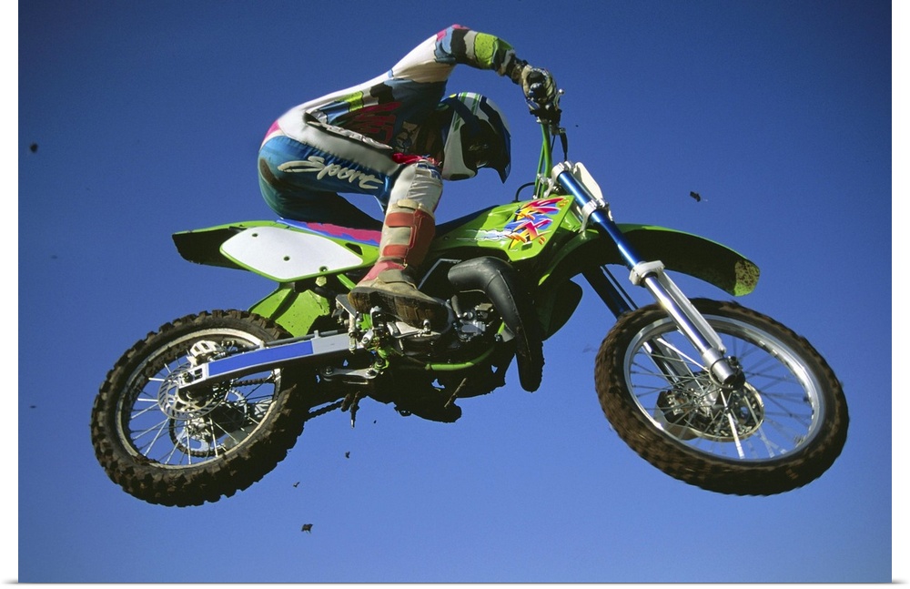 Motocross Bike & Rider Shot From Below As They Fly Though The Air