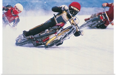 Motorcycle racers on snow