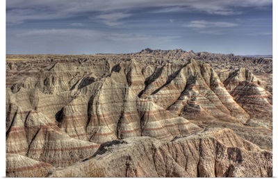 Natural formations in Badlands of South Dakota, showing striations and contours.