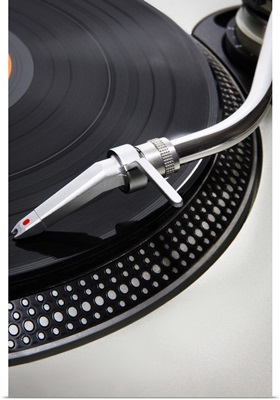 Needle on a turntable playing a record