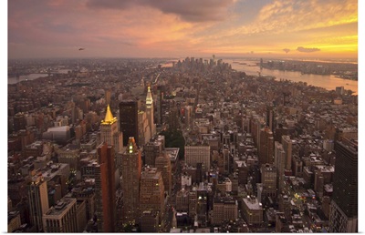 New York City of Manhattan at Sundown with beautiful clouds.