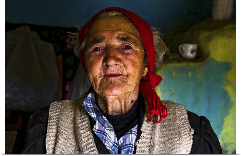 Old woman in rustic house