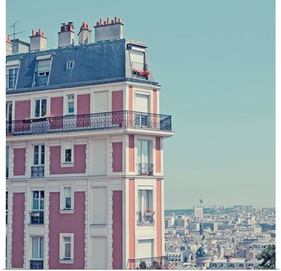 Orange apartment building with view over Paris, Montmartre, Paris, France.