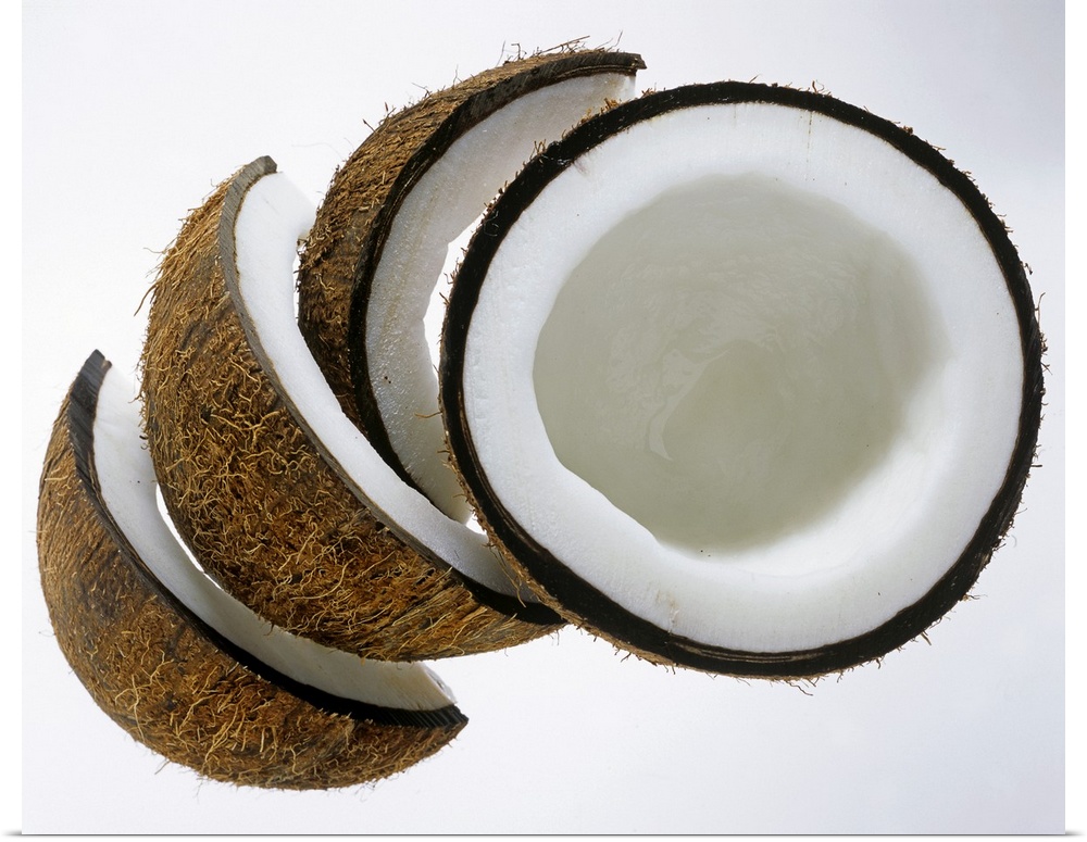 Pieces of coconut against white background, Close-Up