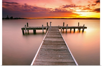 Pier in Lake Macquarie at sunset, Belmont, NSW, Australia.