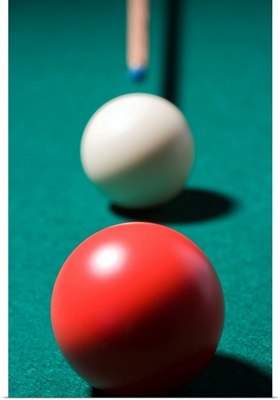 Pool cue with balls