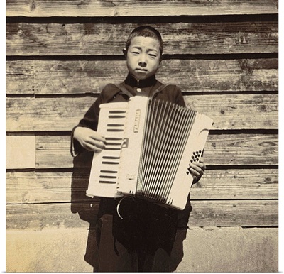 Portrait of a Japanese student playing Accordion