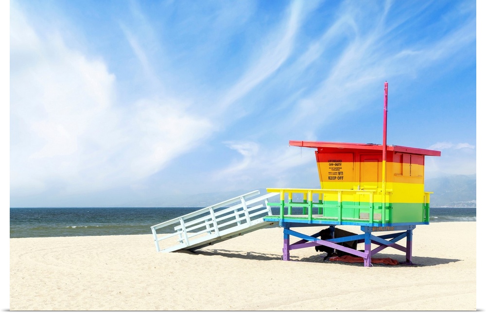 A vibrant photo of a lifeguard tower in the colors of the pride flag, located at Venice Beach, Los Angeles