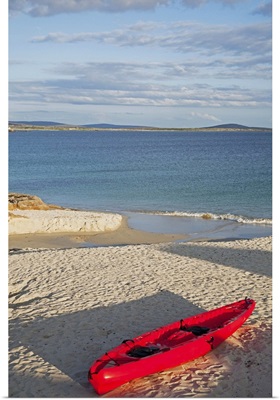 Red canoe on the beach, County Galway, Ireland