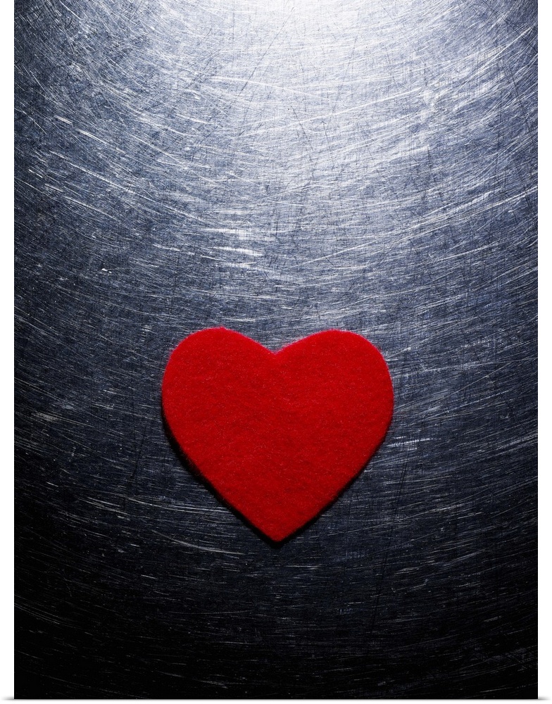 Red Felt Heart on Stainless Steel Background.