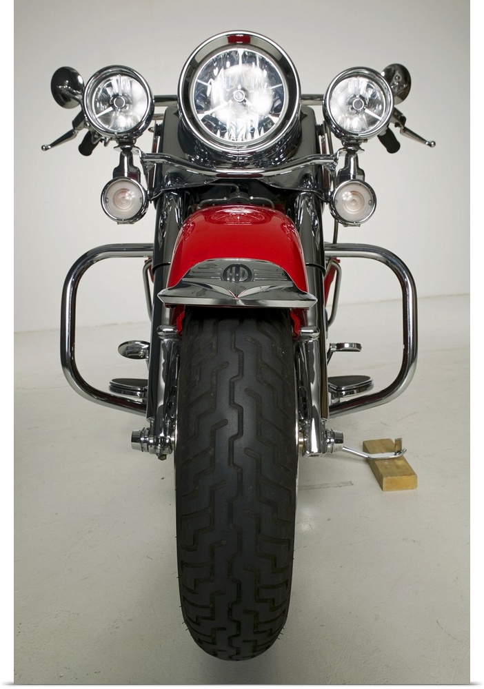 Vertical photo on canvas of a vintage motorcycle seen from the front.