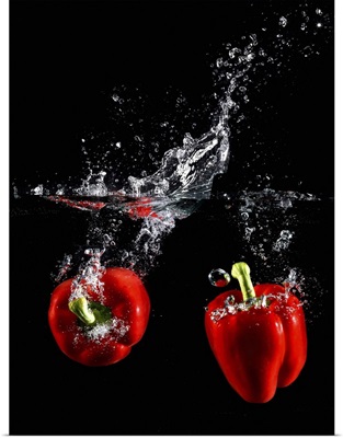 red pepper splashing in water
