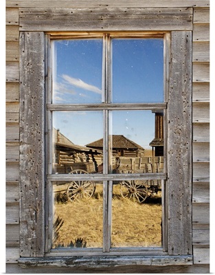 Reflection in window of old western town