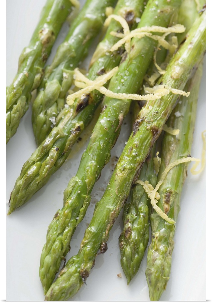 Roasted green asparagus with lemon zest, overhead view