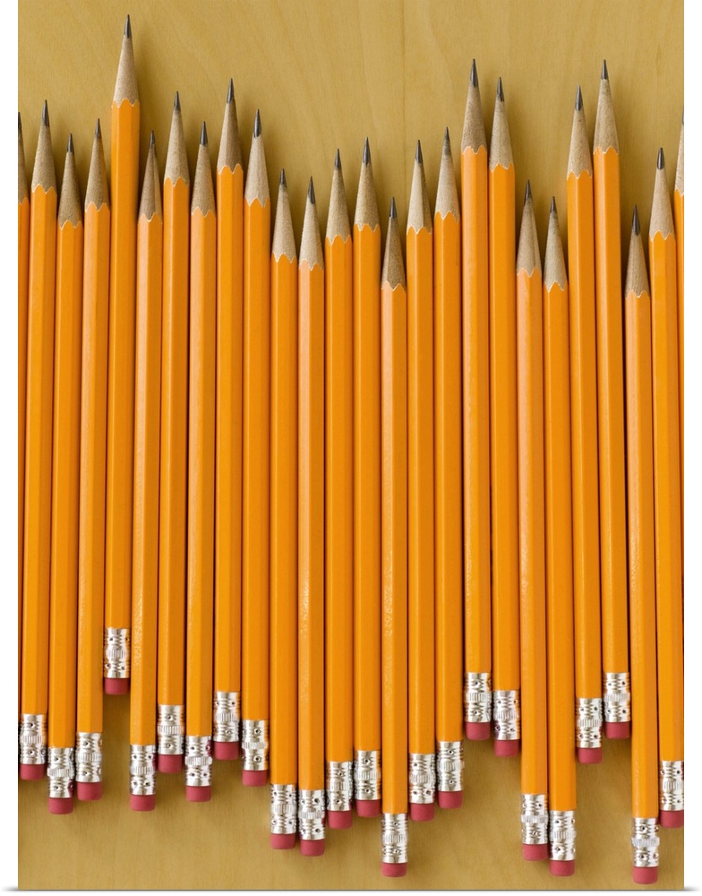 Row of pencils on table