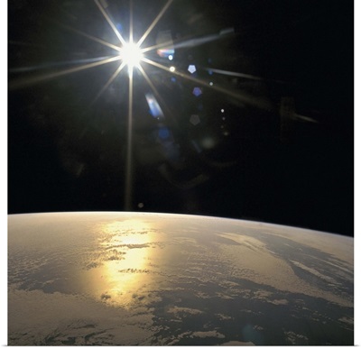 Satellite view of the sunrays falling on the earth's surface