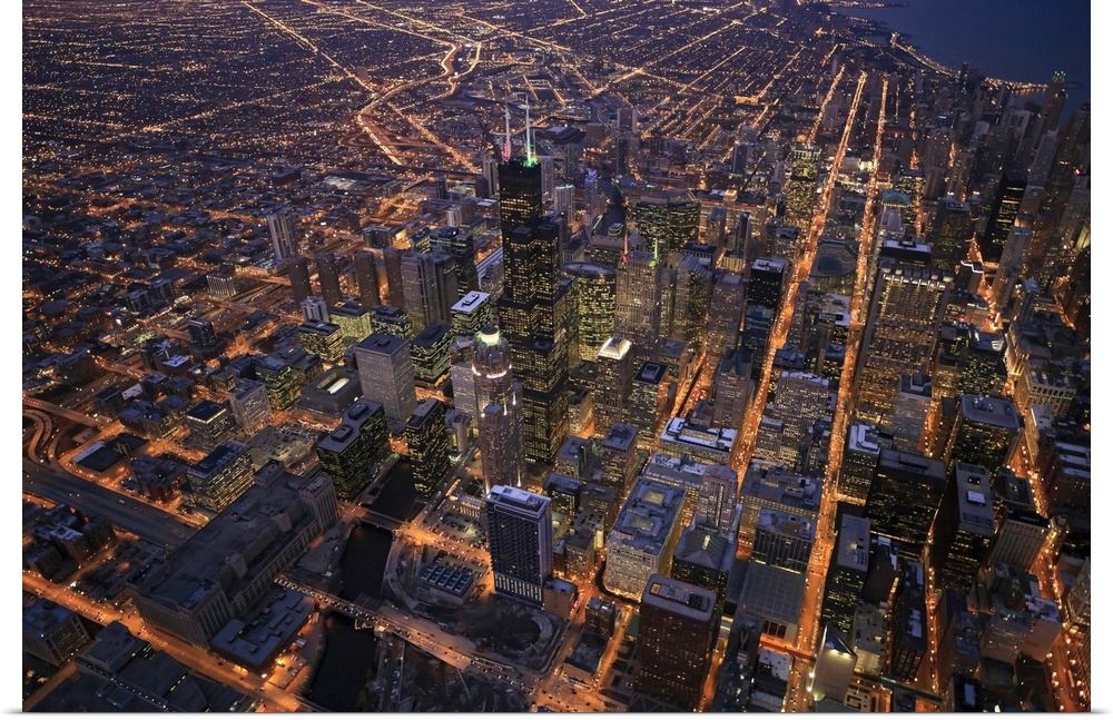 Sears Tower and downtown from above during sunset in December with clear crisp skies. Right in the center - the Sears Tower