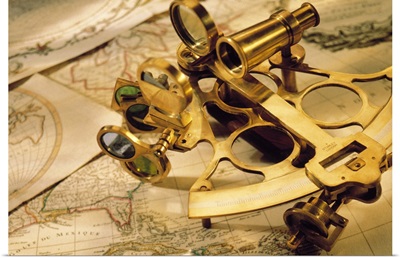 Sextant on top of world maps