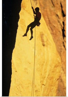 Silhouette of rock climber on Smith Rock, Oregon