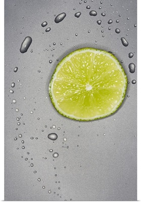 Sliced limes with water droplets