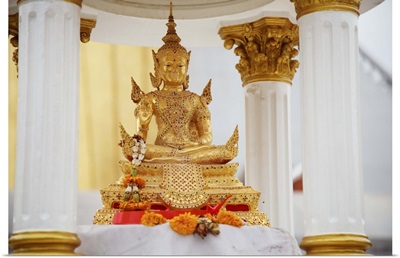 small gold seated thai buddha
