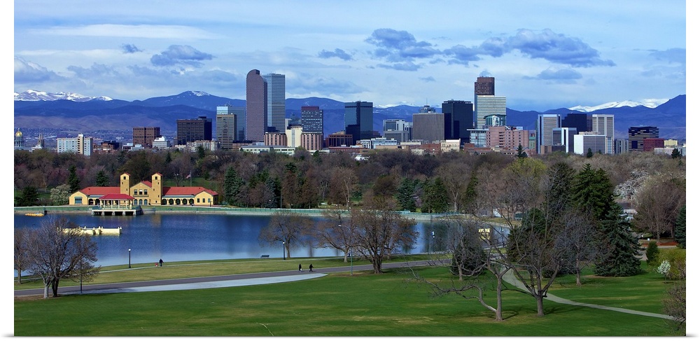 Denver Skyline from City Park with boat house and lake and Mt. Evans in background.