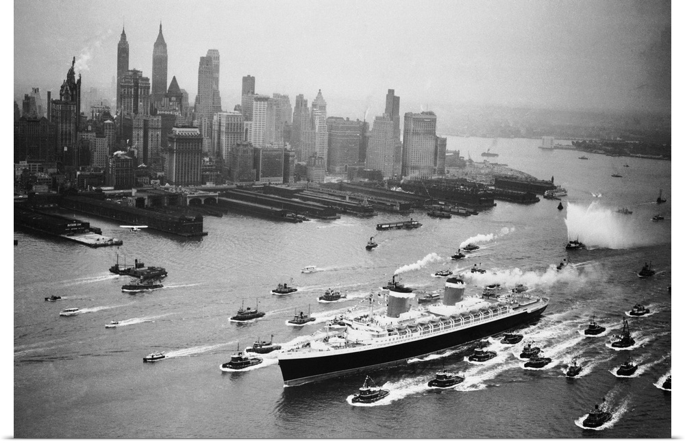 A huge cordon of tugs accompanies the new superliner United States past the New York skyline, June 23, as the 73 million d...