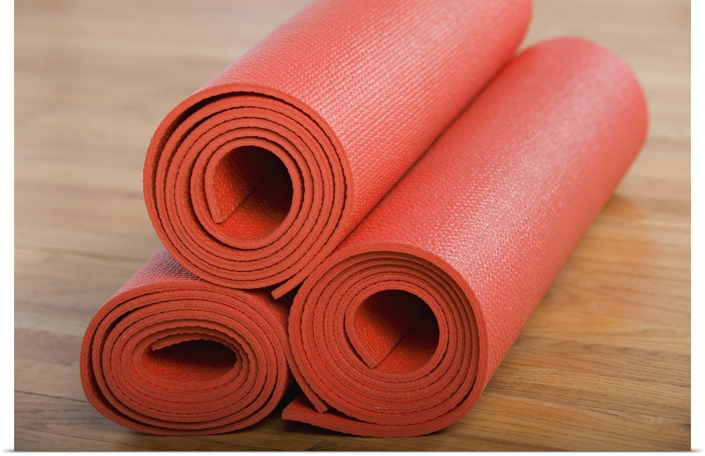 Stack of rolled yoga mats