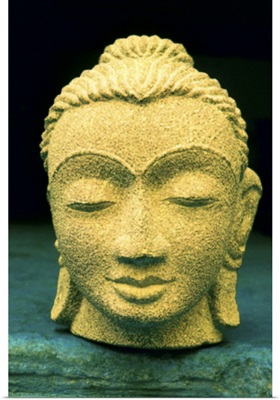 Stone head of Buddha Gold