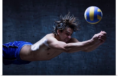 Studio shot of volleyball player playing